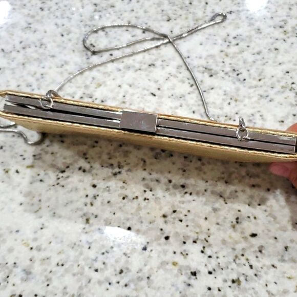 Adrienne Vittadini womans gold leather clutch with cross body strap - Picture 4 of 8